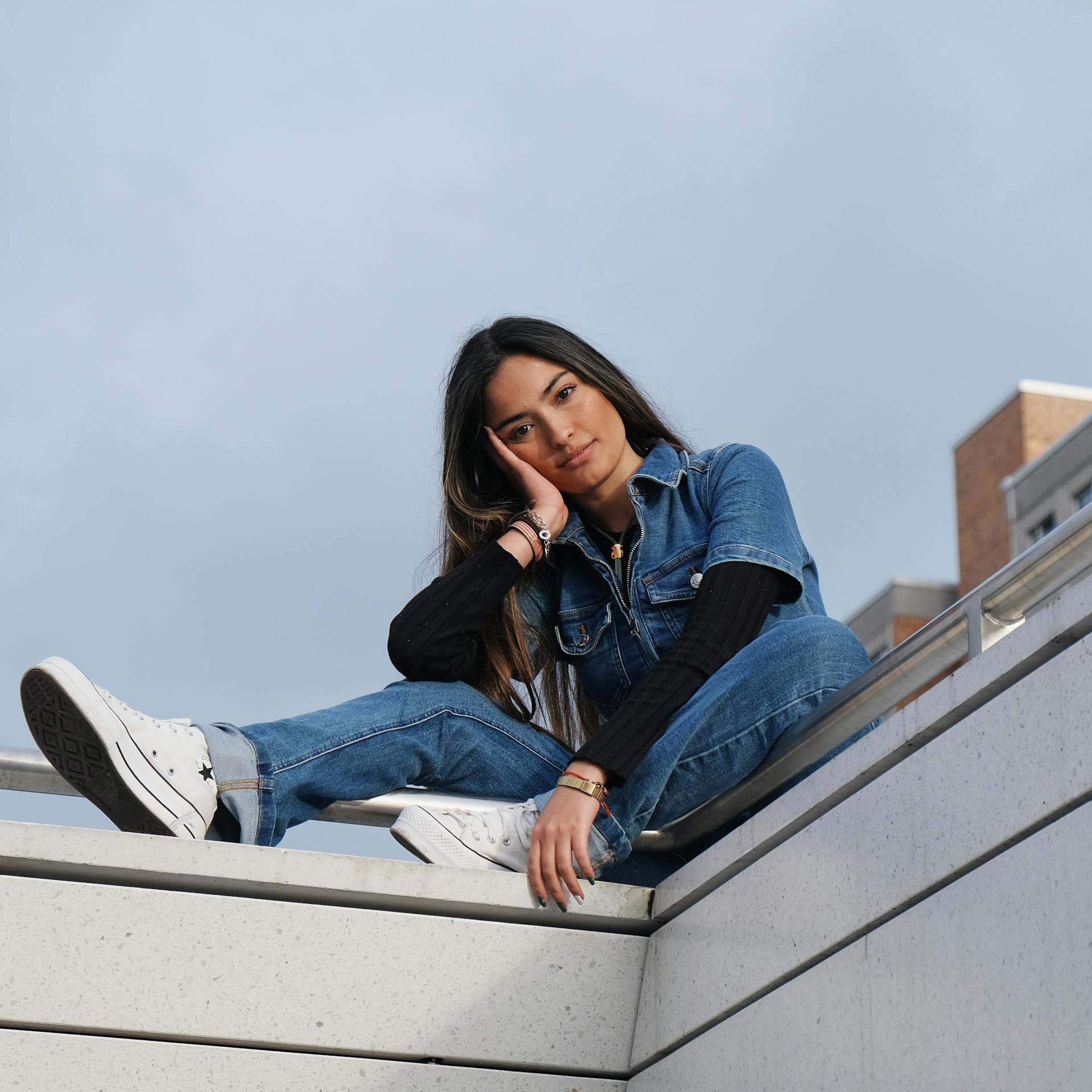 a girl wearing Women's Denim Tops